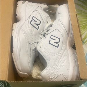 New Balance Women’s 600 White Sneakers with Navy Accents